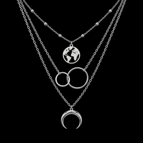 Silver layered moon and world map necklace on black background